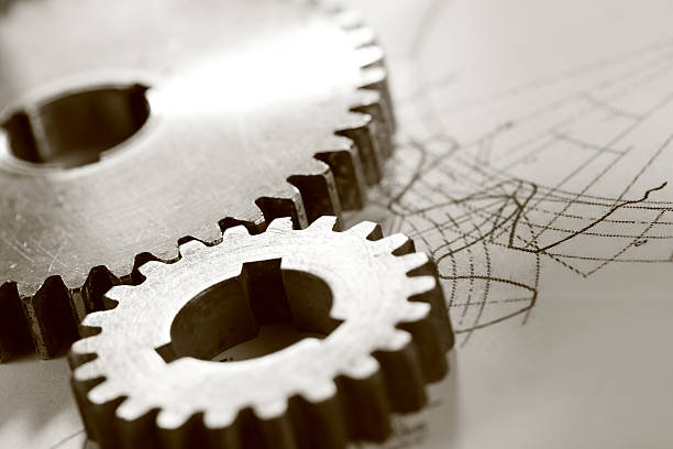 istock Steel cogwheels in connection on drawing 481365793