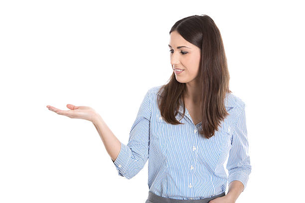 istock Attractive businesswoman in blue presenting with palm. 481365989