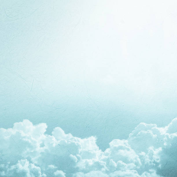 istock sky and clouds in vintage color on mulberry paper texture 481366942