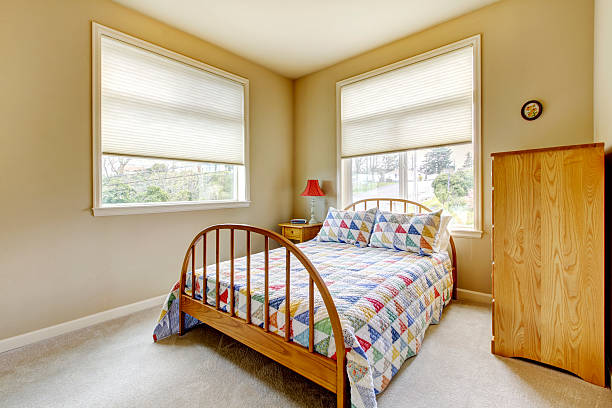 istock SImple guest bedroom with wood old bed. 481375403