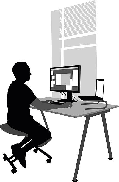 Interface Programmer A vector silhouette illustration of a man sitting at his computer work station. working at home study desk silhouette stock illustrations