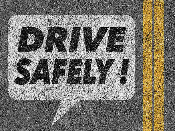 Road with speech bubble and Drive safely text stock photo