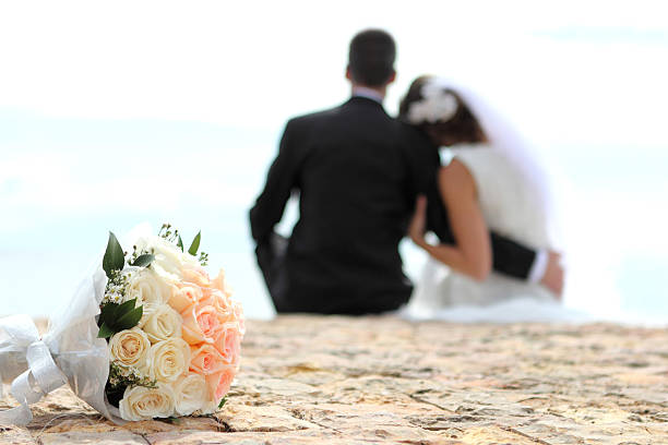 istock bouquet with romantic couple in the background 481377990