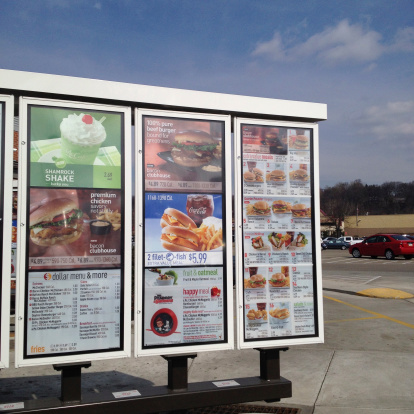Pittsburgh, USA  March 25, 2013  Drive Thru menu of a newer McDonald's featuring the well known Dollar Menu and Shamrock Shake.  Photographed with an iPhone.