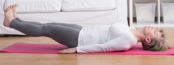 istock Raising legs during yoga 481384352