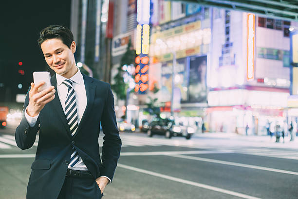 istock Asian businessman answering mobile phone 481384992