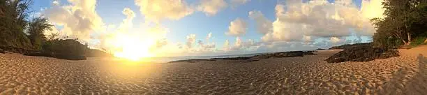 View of the sunset from Secret Beach in Kauai, Hawaii