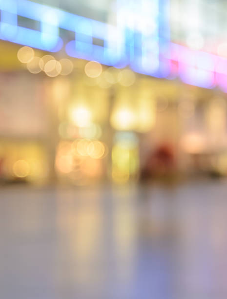 istock Blurred image of shopping mall with shining lights 481387030