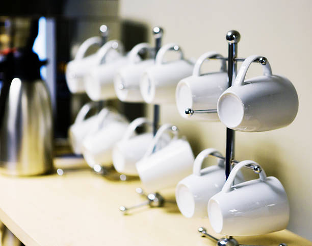 istock Row of coffee mugs in office break room 481389517