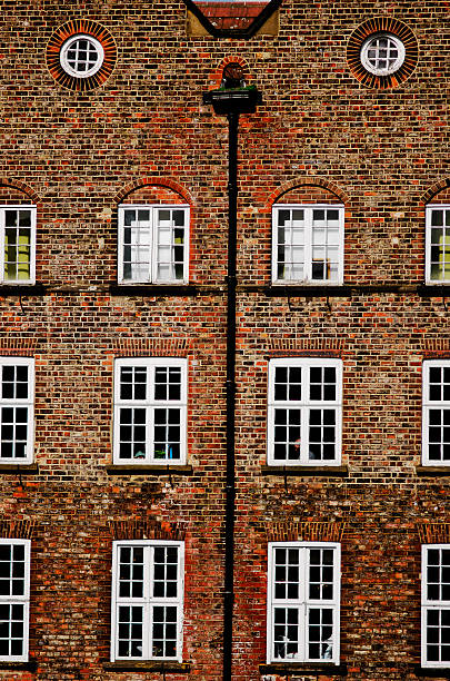 istock Architecture in York. Old brick house with windows. 481391324