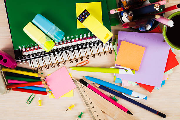 istock School and office accessories on wooden background 481391890