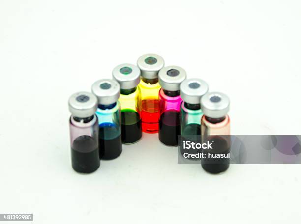 Ampere Bottle Filled With Colorful Elixir Stock Photo - Download Image Now - Anatomy, Blue, Equipment