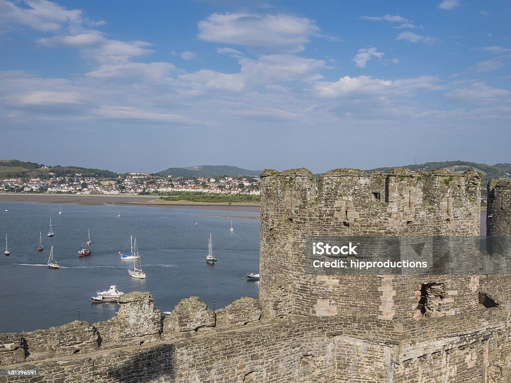 View from Conwy Castle, Wales View from  Conwy Castle in Wales on the Conwy Easturay. The castles was built by king Edward I as one of the fortifications during the conquest of Wales in the 13th Century Architecture Stock Photo