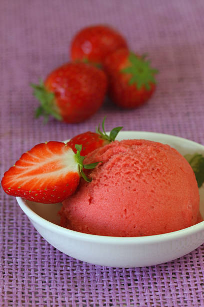Strawberry sorbet and fresh strawberry