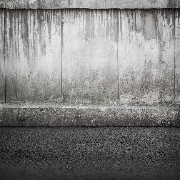 istock Old concrete wall and asphalt. Abstract interior background 481399611
