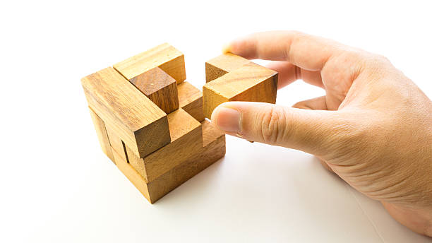 istock Wooden square block cube puzzle. Isolated on white background 481400044