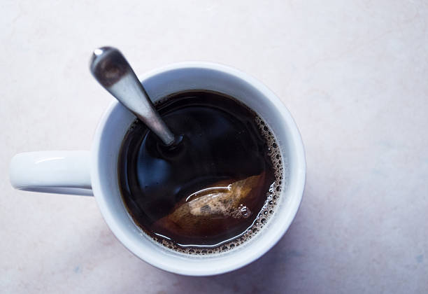 istock Overhead View of Cup of Brewed Tea with Spoon 481400908