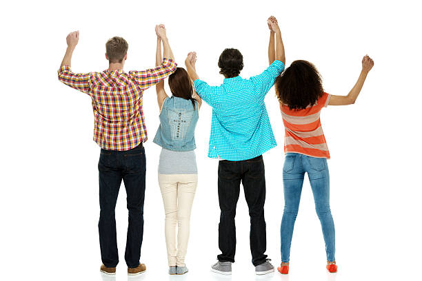 istock Rear view of friends cheering together 481400954