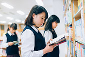 Japanese Female Students Reading in the Library