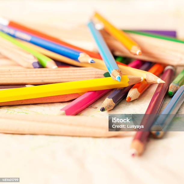 Colored Pencils On Table Stock Photo - Download Image Now - Education, School Building, Sketch Pad