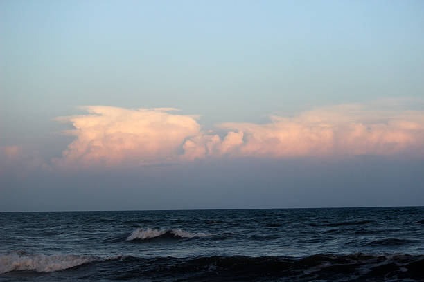 istock Surf and Sunset Sky at North Carolina Beach 481405084