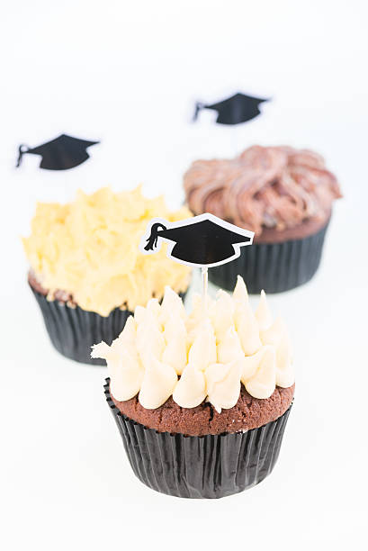 istock Graduation cupcakes with mortar board picks close-up 481407257