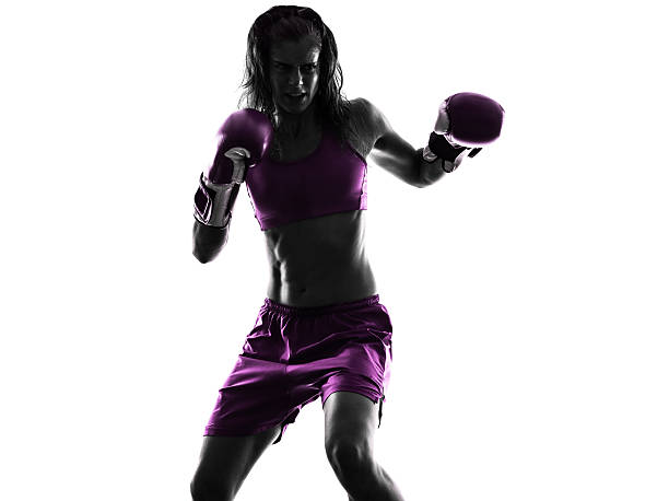 istock woman boxer boxing kickboxing silhouette isolated 481408146