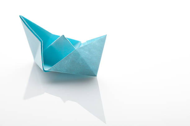 istock Origami paper ship on white background 481408730