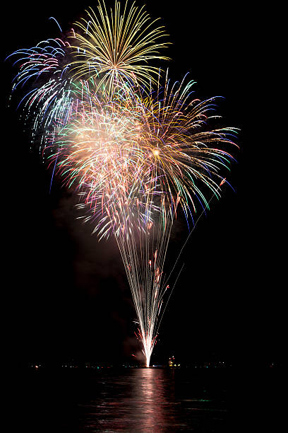 Fireworks with lake reflection stock photo