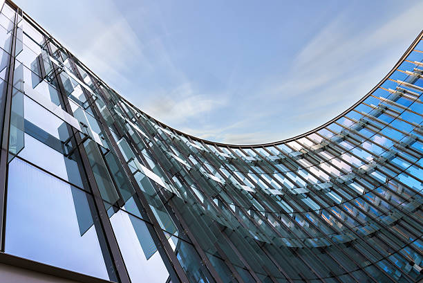 istock Modern Curved Glass Building with Glass Panels. 481409786