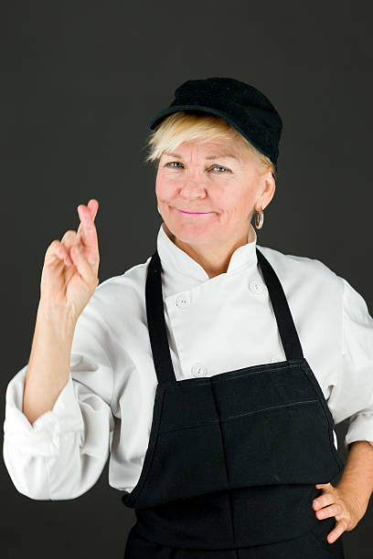 istock model isolated with fingers crossed for luck 481412554