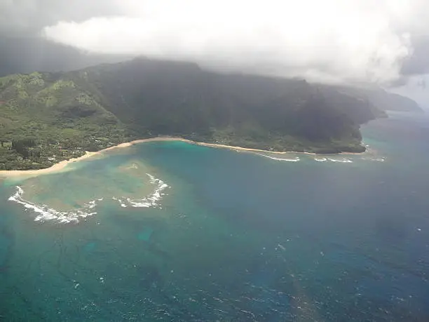 A birds eye view of the Napali Coast in Kauai, Hawaii taken from a helicopter. 