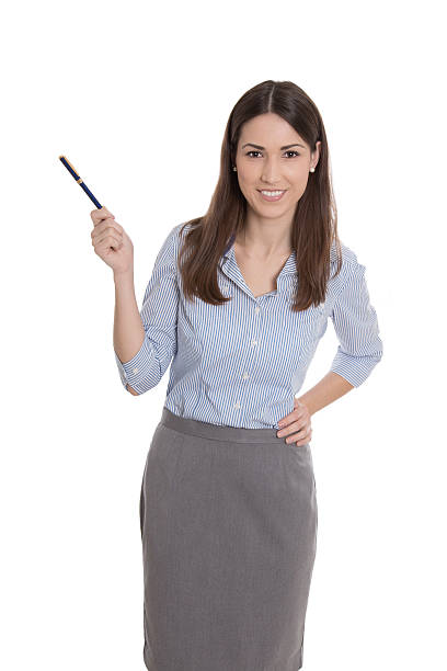 istock Isolated smiling businesswoman presenting with a pen. 481422409