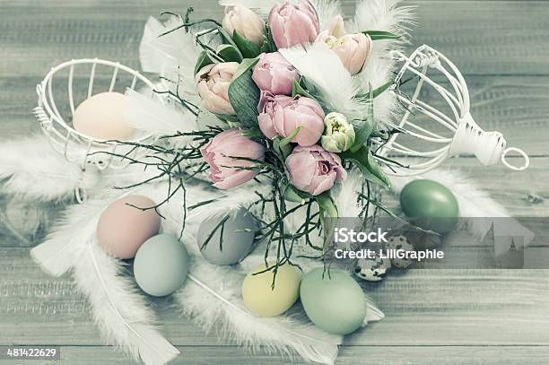 Pastel Tulip Flowers And Easter Eggs Retro Style Stock Photo - Download Image Now - Animal Nest, Antique, Arranging