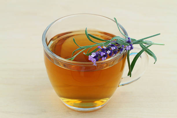 istock Tea and lavender on wooden surface 481423247