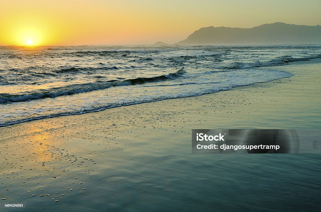Ocean sunset and waves sun sets above the ocean Africa Stock Photo