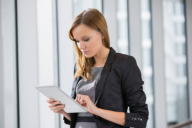 istock Businesswoman using digital tablet in office 481428967