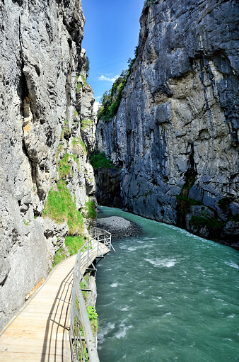 Aare Gorge near Meiringen, Bernese Oberland, Switzerland. The Aare River eroded a path through rock formation resulting in a gorge which is 1400 metres long and up to 200 metres deep