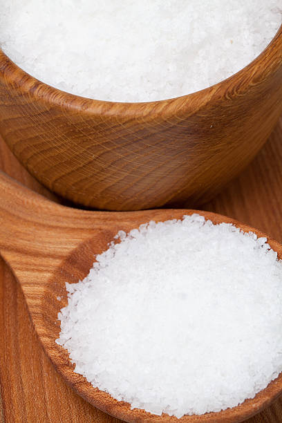 istock sea salt in wooden spoon 481430947