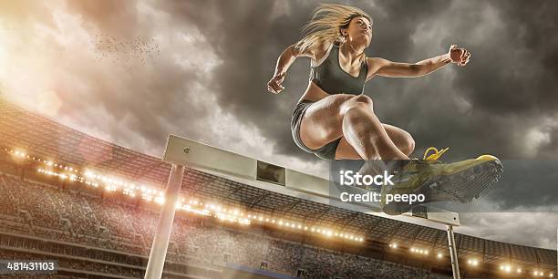 Hurdler In Extreme Close Up Stock Photo - Download Image Now - Sport, Winning, Hurdling - Track Event