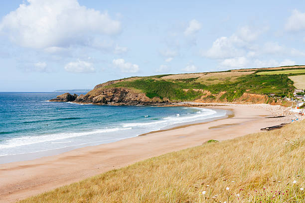 Praa Sands beach in-between Penzance and Helston and near to the small fishing port of Porthleven on the south coast of Cornwall, England. The beach is popular with tourists and surfers alike.