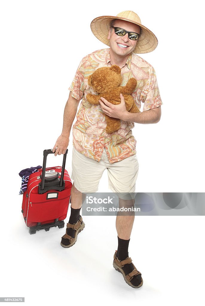 Funny Traveler. Happy traveler with his Teddy bear going to vacations. Adult Stock Photo