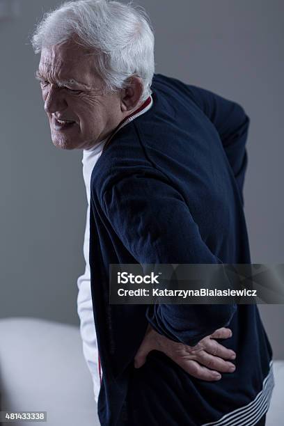 Old Man Backpain Stock Photo - Download Image Now - 2015, Adult, Adults Only