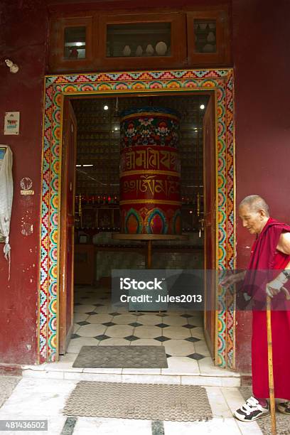 Old Tibetan Nun And Prayer Wheel Mcleod Ganj Dharansala Stock Photo - Download Image Now