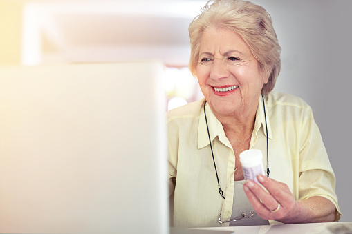 Shot of a senior woman researching her medication onlinehttp://195.154.178.81/DATA/i_collage/pu/shoots/805326.jpg