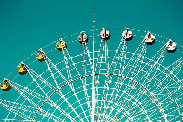 istock ferris wheel in the blue sky 481437684
