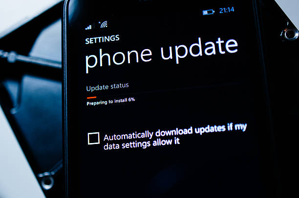 Phone Update progress bar Paris, France - January 19, 2015: Phone Update progress bar on digital display of a Lumia Phone to Windows 8.1 operating system. phone nokia stock pictures, royalty-free photos & images