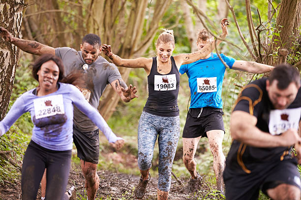 istock Competitors running in a forest at an endurance event 481448476