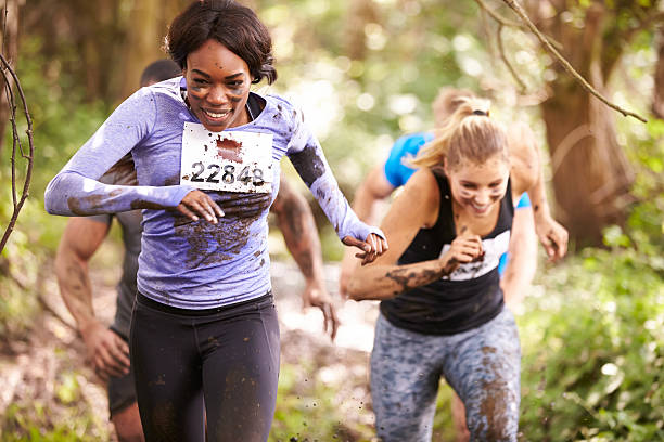 istock Two women running in a forest at an endurance event 481448486