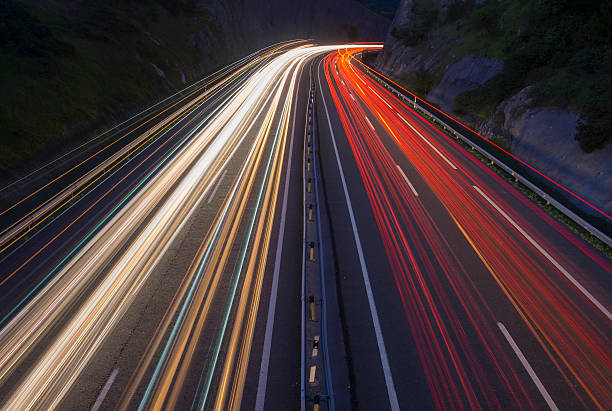 istock Car lights at night on the road in the highway. 481448556